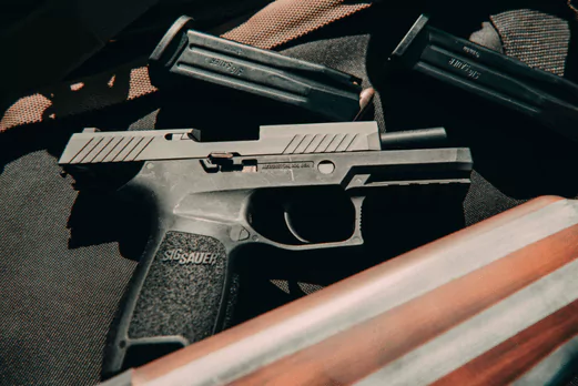 Police Arrest Three and Seize Firearm in All Saints
